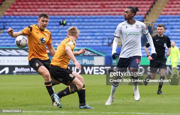 Bolton Wanderers' Paris Maghoma passes the ball to set up the second goal scored by Aaron Collins during the Sky Bet League One match between Bolton...