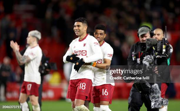 Casemiro of Manchester United celebrates with teammate Amad Diallo after the Emirates FA Cup Fifth Round match between Nottingham Forest and...