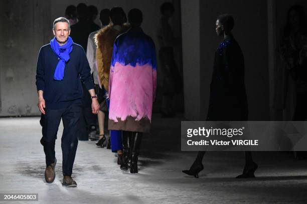 Fashion designer Dries Van Noten walks the runway during the Dries Van Noten Ready to Wear Fall/Winter 2024-2025 fashion show as part of the Paris...