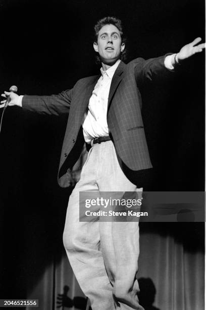 American stand-up comedian Jerry Seinfeld performs onstage at Northwestern University, Evanston, Illinois, May 26, 1988.