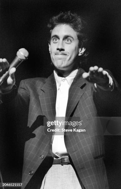 American stand-up comedian Jerry Seinfeld performs onstage at Northwestern University, Evanston, Illinois, May 26, 1988.