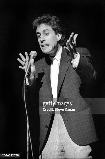 American stand-up comedian Jerry Seinfeld performs onstage at Northwestern University, Evanston, Illinois, May 26, 1988.