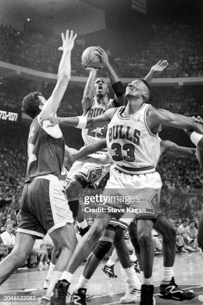 View of, from left, Serbian basketball player Vlade Divac, of the Los Angeles Lakers, and American players Michael Jordan & Scottie Pippen, both of...