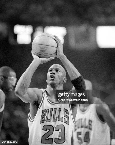 View of American basketball player Michael Jordan, of the Chicago Bulls, on the court during the first game of the NBA finals, Chicago, Illinois,...