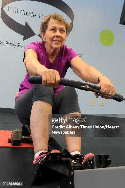 Margaret French of Saratoga Springs uses the rowing machine at Full Circle Fitness on Thursday, Feb. 12, 2015 in Albany, N.Y. The 71-yr-old is...