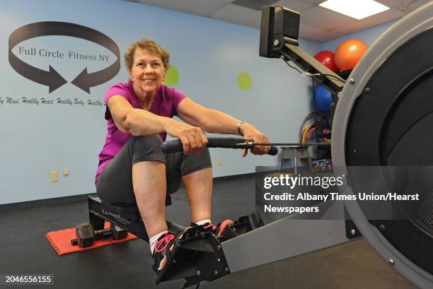 Margaret French of Saratoga Springs uses the rowing machine at Full Circle Fitness on Thursday, Feb. 12, 2015 in Albany, N.Y. The 71-yr-old is...