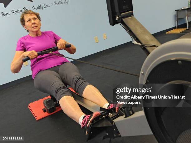 Margaret French of Saratoga Springs uses the rowing machine at Full Circle Fitness on Thursday, Feb. 12, 2015 in Albany, N.Y. The 71-yr-old is...