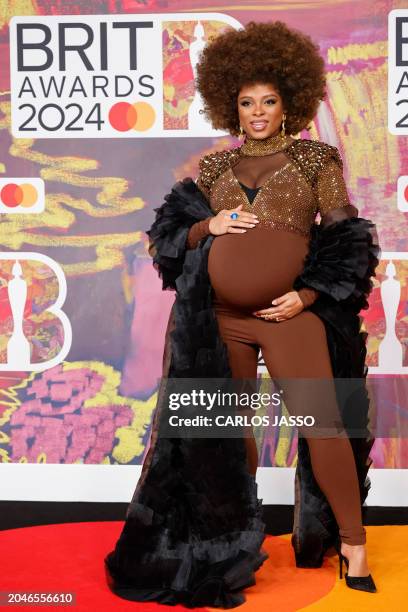 British singer-songwriter Fleur East poses on the red carpet upon arrival for the BRIT Awards 2024 in London on March 2, 2024. / RESTRICTED TO...