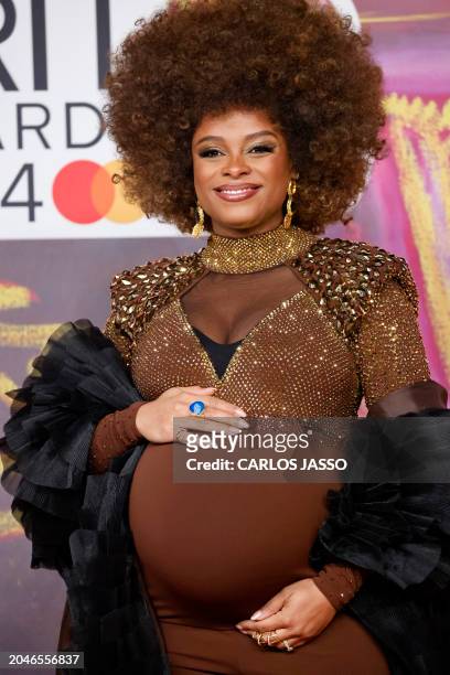 British singer-songwriter Fleur East poses on the red carpet upon arrival for the BRIT Awards 2024 in London on March 2, 2024. / RESTRICTED TO...