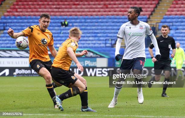 Bolton Wanderers' Paris Maghoma passes the ball to set up the second goal scored by Aaron Collins during the Sky Bet League One match between Bolton...