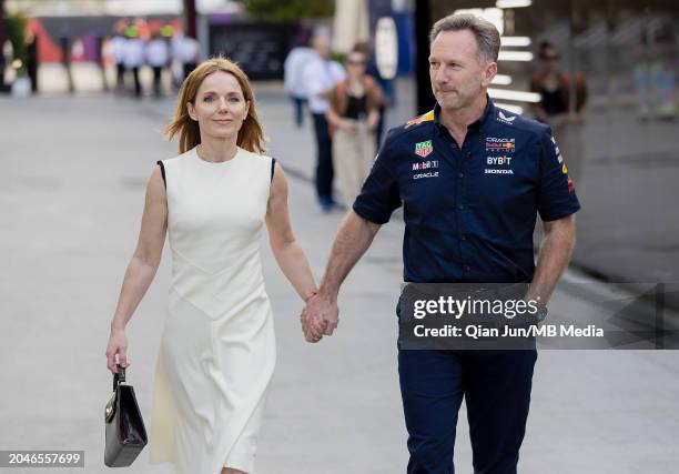 Christian Horner of Great Britain and Oracle Red Bull Racing holds hands with Geri Halliwell during the F1 Grand Prix of Bahrain at Bahrain...