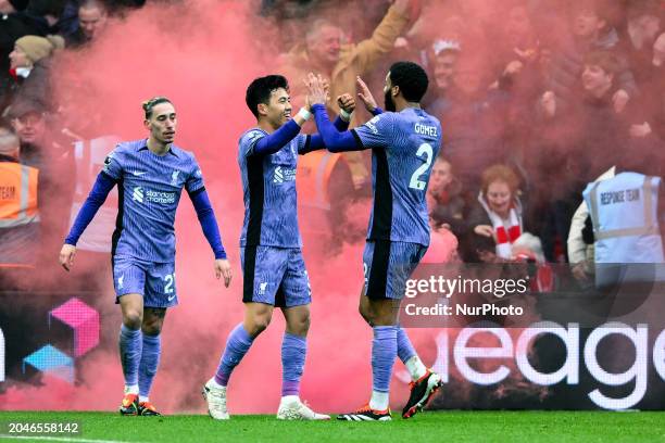 Wataru Endo and Joe Gomez of Liverpool are celebrating after Darwin Nunez scores a goal to make it 0-1 during the Premier League match between...