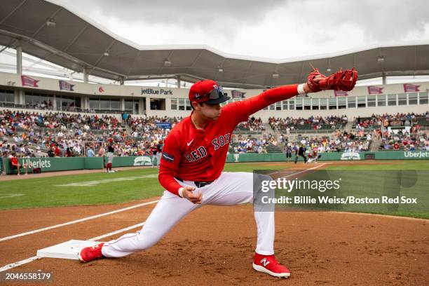 Triston Casas of the Boston Red Sox warms up during the first inning of a Spring Training Grapefruit League game against the Washington Nationals on...