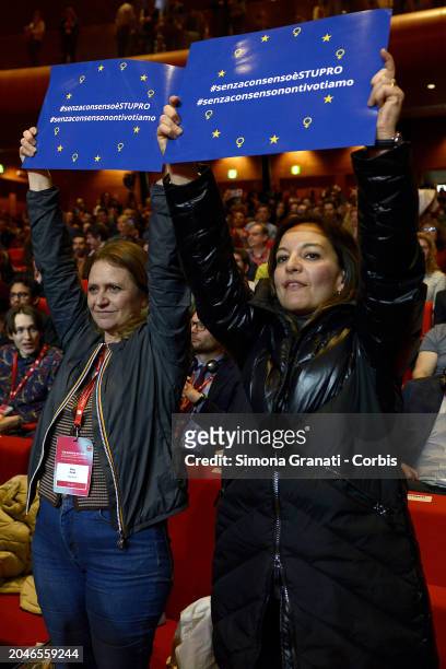 Women hold banner reading "Senza consenso è stupro -senza consenso non ti votiamo ( without consent it is rape-without consensus we won't vote for...