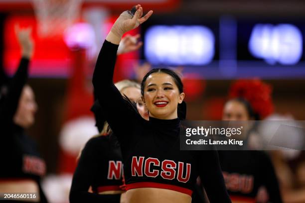 Cheerleaders of the NC State Wolfpack perform during the game against the Syracuse Orange at Reynolds Coliseum on February 29, 2024 in Raleigh, North...