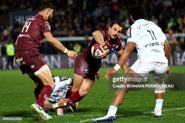 Bordeaux-Begles' French full back Nans Ducuing passes the ball during the French Top14 rugby union match between Union Bordeaux-Begles and Racing 92...