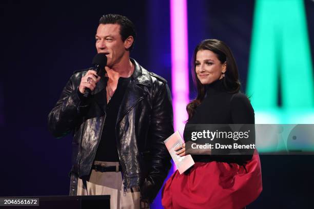 Luke Evans and Marisa Abela present at The BRIT Awards 2024 at The O2 Arena on March 2, 2024 in London, England.