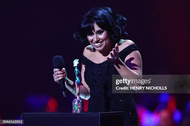 British singer-songwriter Rachel Keen, known as Raye reacts after receiving the song of the year award for "Escapism." during BRIT Awards 2024...