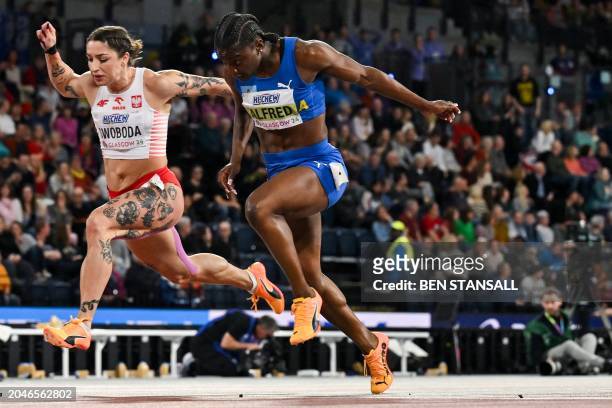 Second-placed Poland's Ewa Swoboda and first-placed Saint Lucia's Julien Alfred cross the finish line in the Women's 60m final during the Indoor...