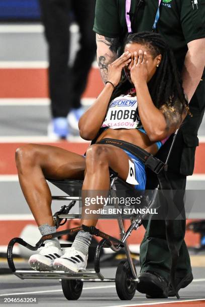 S Aleia Hobbs is evacuated after injuring herself during the warm up prior to the Women's 60m final during the Indoor World Athletics Championships...