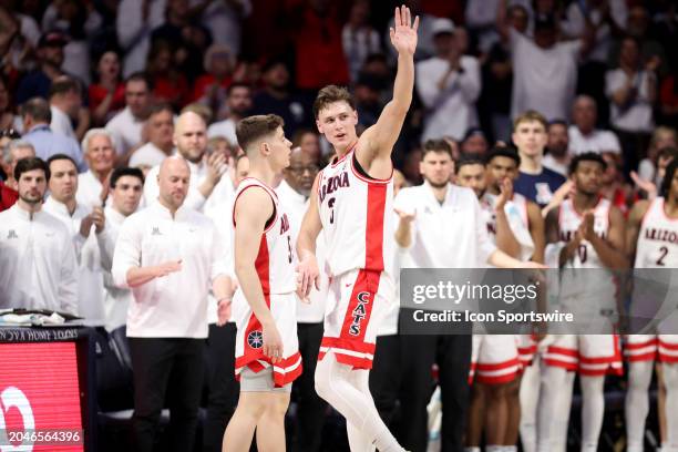 Arizona Wildcats guard Pelle Larsson acknowledges the crowd near the end of the last home game basketball game between the Oregon Ducks and the...