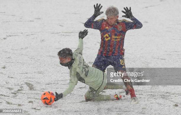 Diego Luna of Real Salt Lake reacts as he trips Eduard Atuesta of the Los Angeles Football Club during the first half of their game at the America...