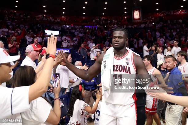 Arizona Wildcats center Oumar Ballo celebrates with the crowd after defeating the Oregon Ducks 103-83 on March 2, 2024 at McKale Center in Tucson, AZ.