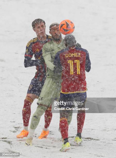 Andres Gomez and Bode Hidalgo of Real Salt Lake battle for the ball against Denis Bouanga of the Los Angeles Football Club during the first half of...