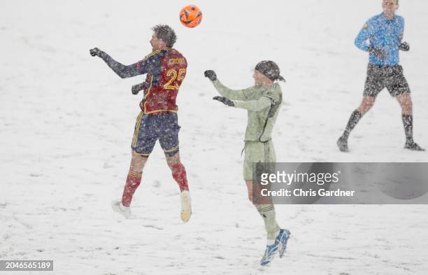 Illie Sanchez of the Los Angeles Football Club wins a head ball over Matt Crooks of Real Salt Lake during the first half of their game at the America...