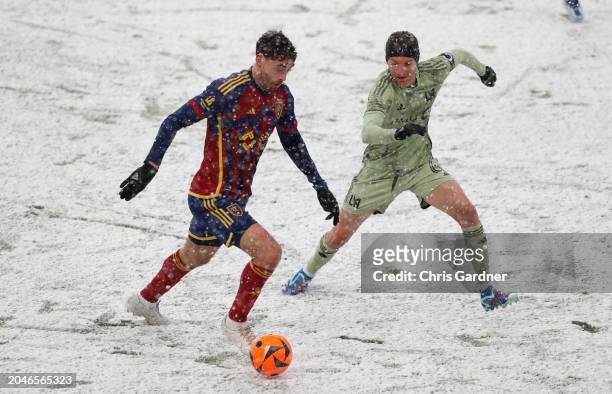 Matt Crooks of Real Salt Lake is pressured by Illie Sanchez of the Los Angeles Football Club during the first half of their game at the America First...