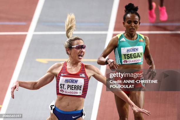 S Elle St. Pierre crosses the finish line in front of Ethiopia's Gudaf Tsegay to win the Women's 3000m final during the Indoor World Athletics...