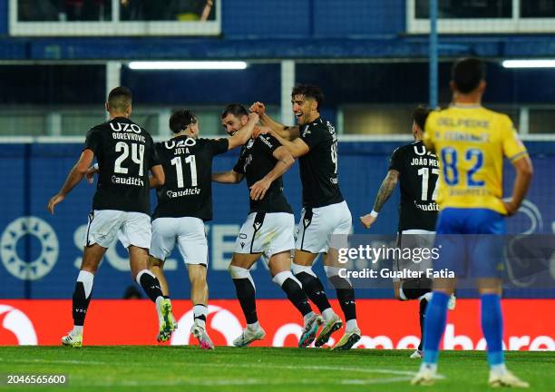 Nelson Oliveira of Vitoria SC celebrates with teammates after scoring a goal during the Liga Portugal Betclic match between GD Estoril Praia and...