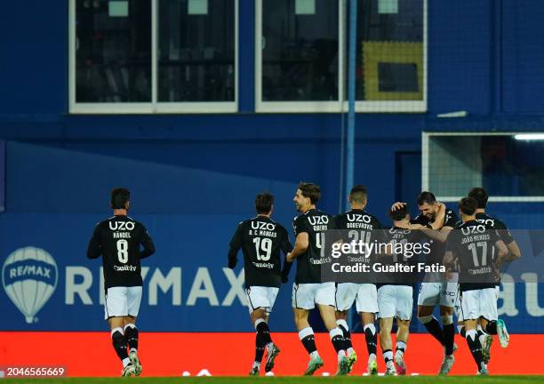 Nelson Oliveira of Vitoria SC celebrates with teammates after scoring a goal during the Liga Portugal Betclic match between GD Estoril Praia and...