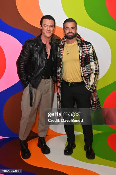 Luke Evans and Fran Tomas attend the Universal Music BRIT Awards after-party at 180 The Strand on March 2, 2024 in London, England.