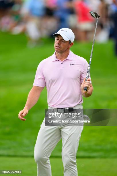 Rory McIlroy of Northern Ireland reacts after missing his putt at the eighteenth hole during the third round of Cognizant Classic in The Palm Beaches...