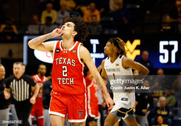 Pop Isaacs of the Texas Tech Red Raiders reacts after hitting a three against the West Virginia Mountaineers in the second half at the WVU Coliseum...