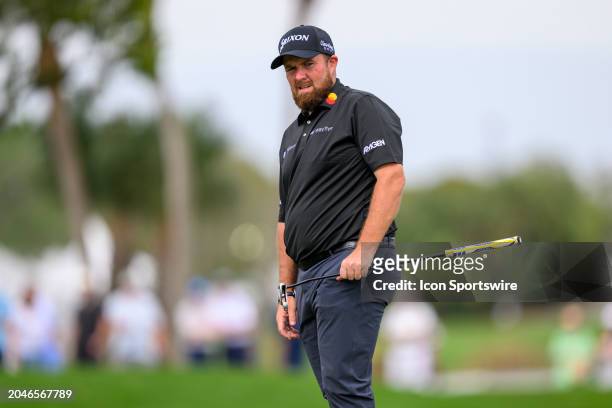 Shane Lowry of Ireland watches the ball after putting at the tenth hole during the third round of Cognizant Classic in The Palm Beaches at PGA...