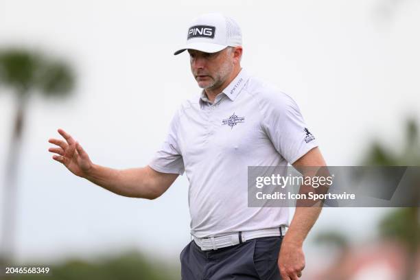 Davis Skinns of England waves to the fans at the tenth hole during the third round of Cognizant Classic in The Palm Beaches at PGA National Resort...