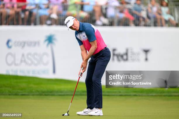Martin Laird of Scotland lines putts at the tenth hole during the third round of Cognizant Classic in The Palm Beaches at PGA National Resort the...