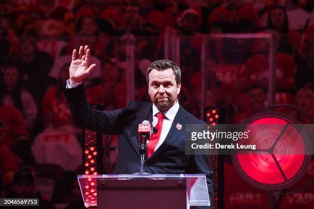 Miikka Kiprusoff of the Calgary Flames waves to the crowd during his jersey retirement ceremony prior to an NHL game against the Pittsburgh Penguins...