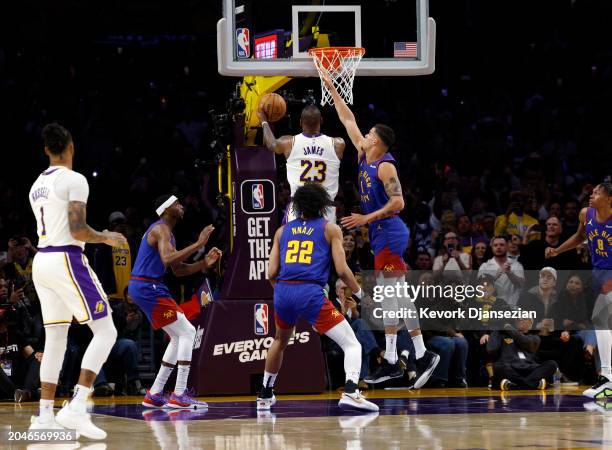 LeBron James of the Los Angeles Lakers scores his 40,000th career point during the first half against Michael Porter Jr. #1 of the Denver Nuggets at...
