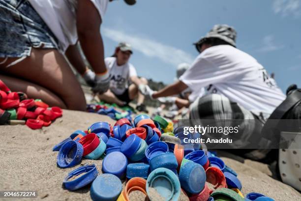 Group of volunteers gather on the beaches of the capital to clean the beaches of the Chorrillos district on March 2, 2024 in Lima, Peru. The...