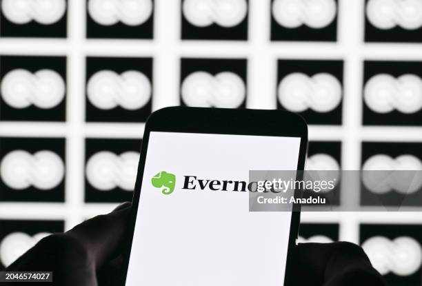 In this photo illustration, Evernote logo is displayed on a mobile phone screen with Bending Spoons icon in back of it, in Ankara, Turkey on March 2,...