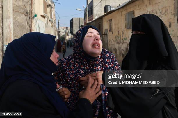 Rania Abu Anza the mother of twin babies Naeem and Wissam, killed in an overnight Israeli air strike, mourns their death ahead of their burial in...