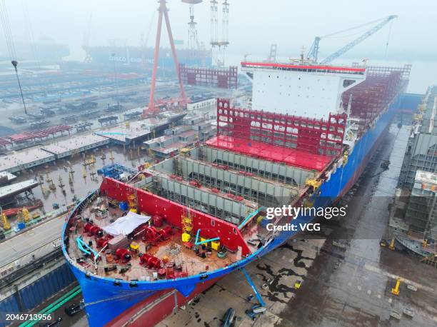 Aerial view of a ship under construction at a shipbuilding firm on February 28, 2024 in Yangzhou, Jiangsu Province of China.