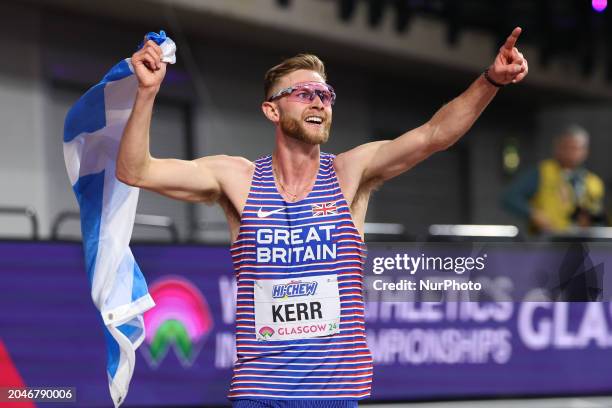 Josh Kerr is celebrating winning gold with the Saltire during the 2024 World Athletics Championships at the Emirates Arena in Glasgow, Scotland, on...