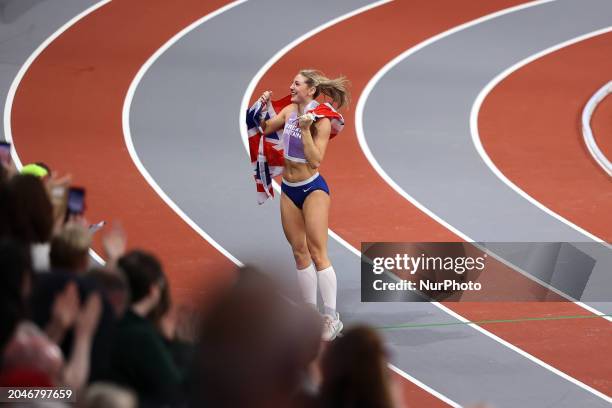 Molly Caudery from Great Britain is celebrating her gold medal win in the pole vault event at the 2024 World Athletics Championships in the Emirates...