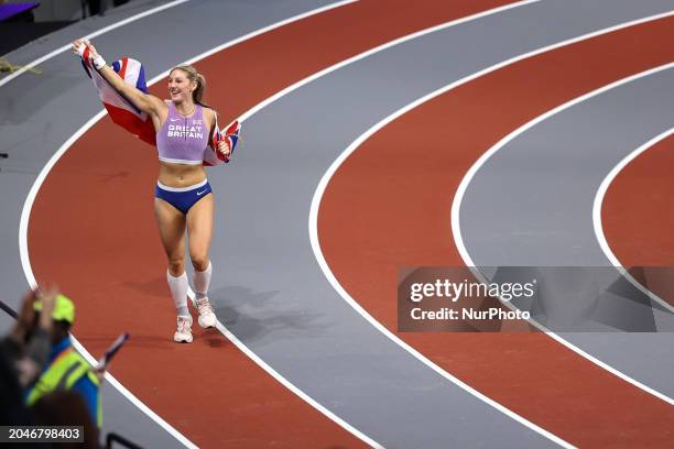 Molly Caudery from Great Britain is celebrating her gold medal win in the pole vault event at the 2024 World Athletics Championships in the Emirates...