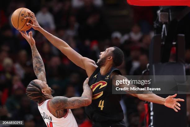 Evan Mobley of the Cleveland Cavaliers blocks a shot by DeMar DeRozan of the Chicago Bulls during the first half at the United Center on February 28,...