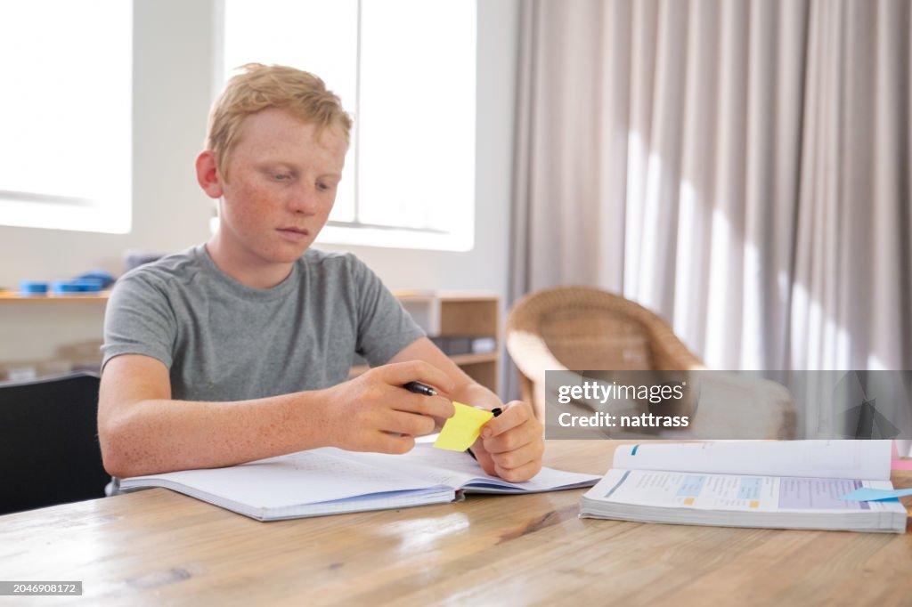 Boy Opening Note School Boy Goes Through The Notes His Teacher Made In His Workbook High ...